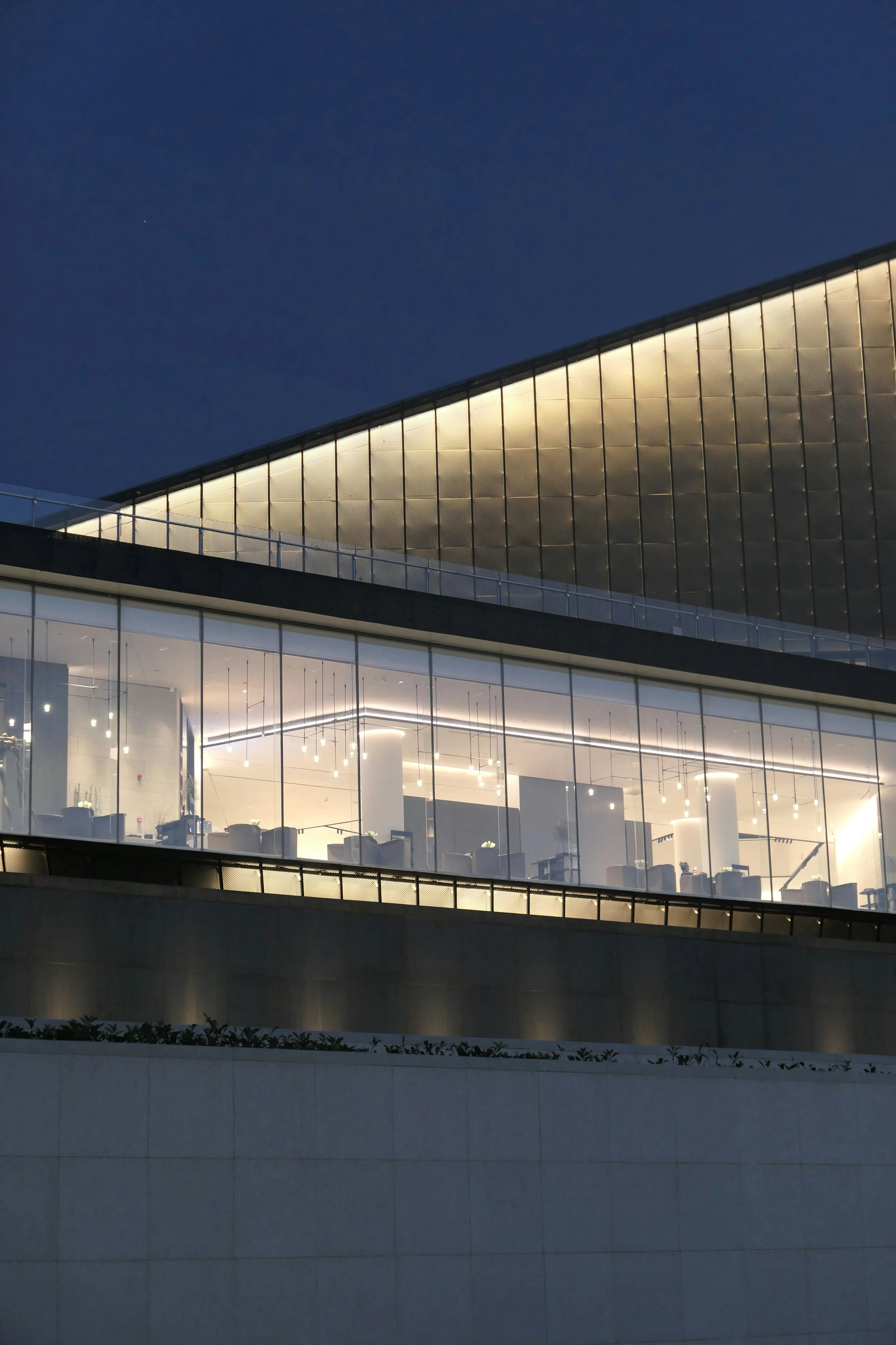 Modern glass building at night